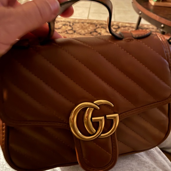Gucci Handbags - Gucci Brown Marmont Quilted Mini Bag with Gold Logo